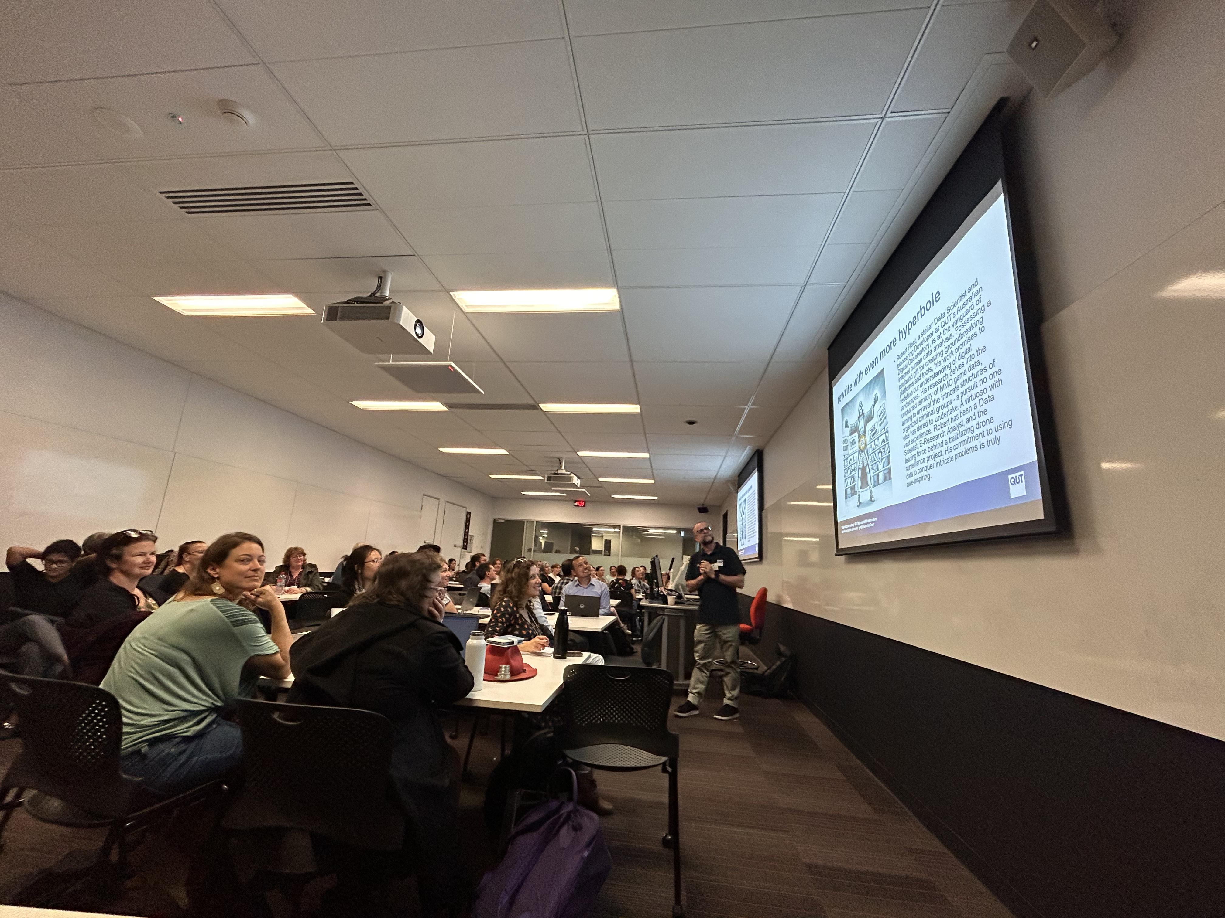 Photo of man presenting in a room